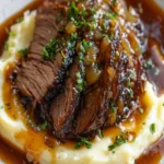 Mustard Brisket With Mashed Potatoes and Maple-Onion Sauce First Image First Image